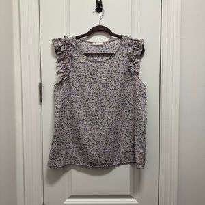 Ruffled sleeveless blouse